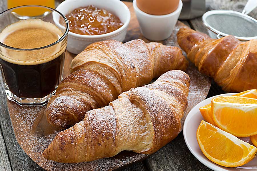 French food - delicious breakfast croissant and coffee