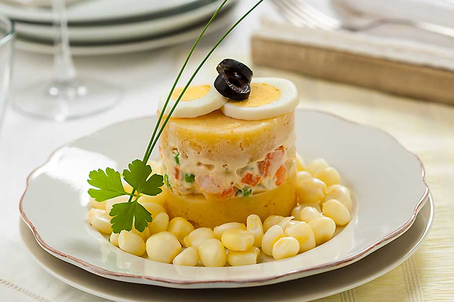 Causa rellena, layered potato and chicken, a typical dish from Peru