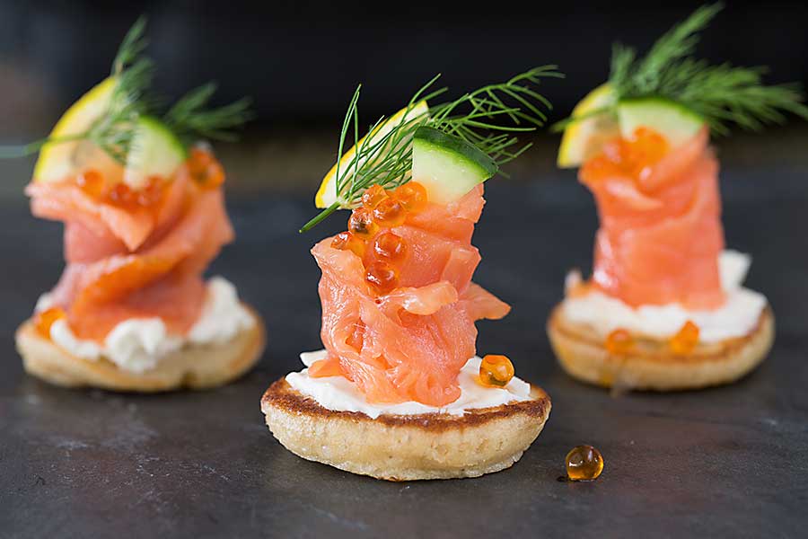 Blini canapes with salmon