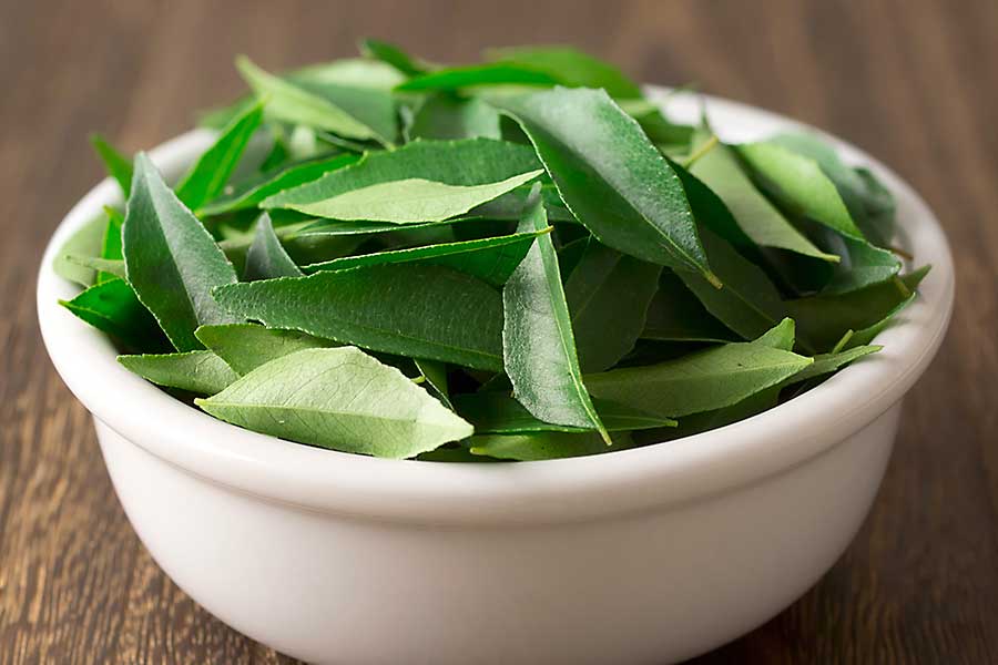 Curry leaves in the bowl