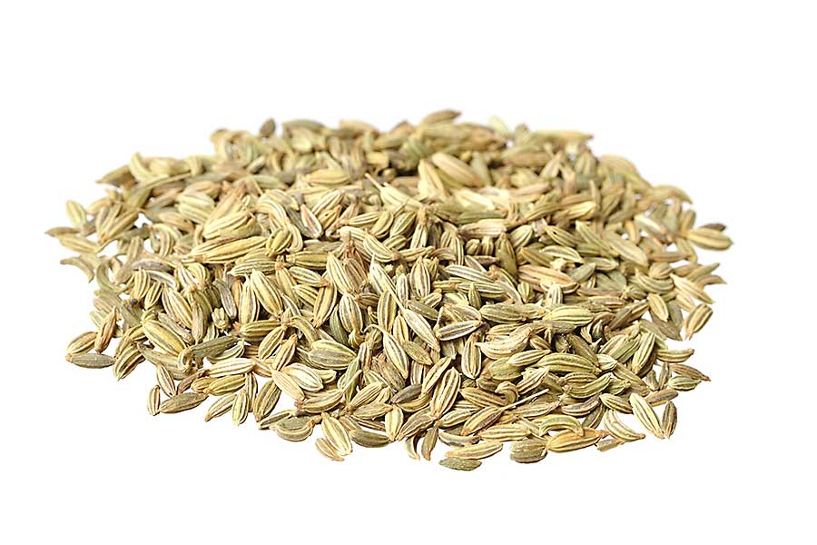 Fennel seeds closeup on white