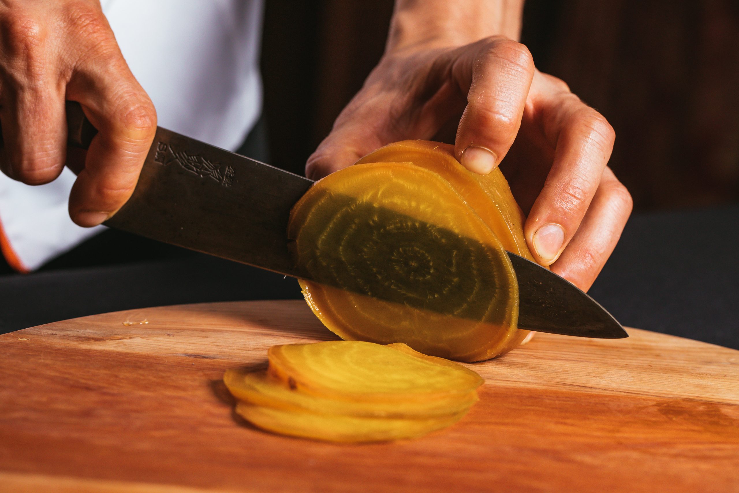 slicing a vegetable ingredient