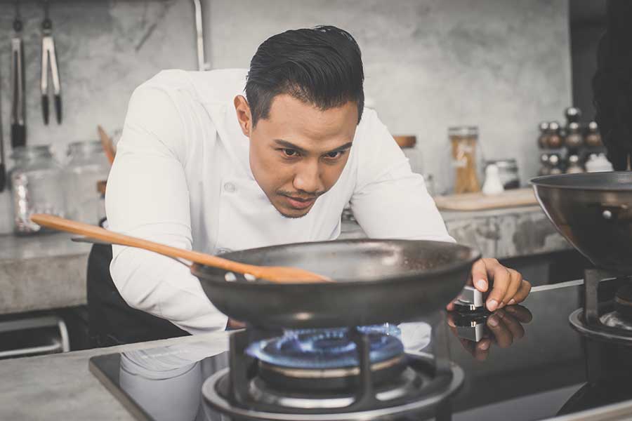 Asian-looking-chef-cooking