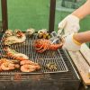Lobster grilled barbecued seafood in BBQ Flames