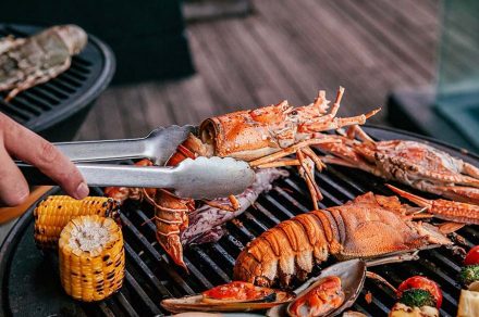 Lobster and mix seafood barbecue cooking on grill