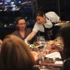Chef Sasha serving a group of ladies