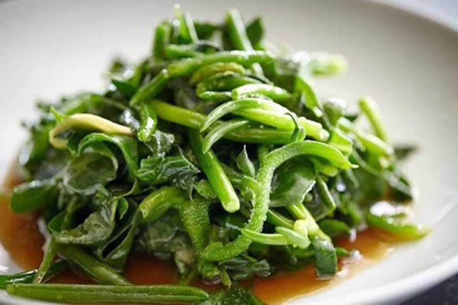 australia female chef Kylie Kwong signature dish native greens