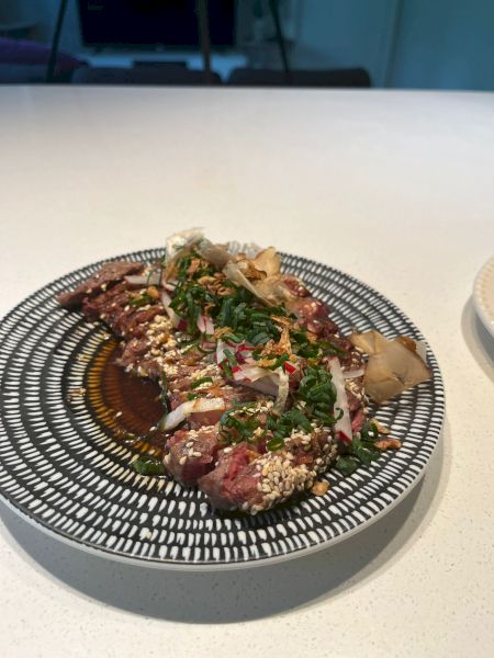 Chef Icaro Conceicao Steak Tataki, Japanese ponzu, radish, dashi