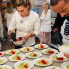Chef Julia Shelley Plating Food At Private Dining