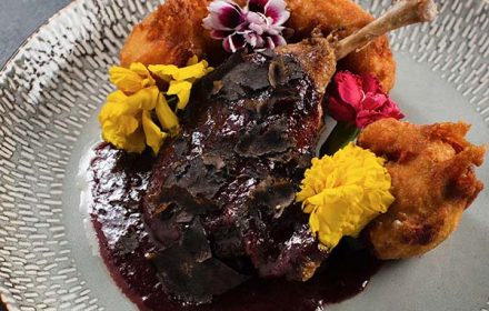Chef Jonathan Barone Private Chef Duck Leg Dish With Floral Decorations