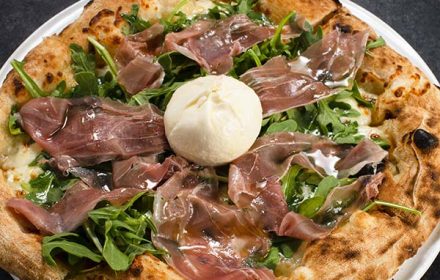 Chef Jonathan Barone Prosciutto Pizza Topped With Roquette And Mozarella