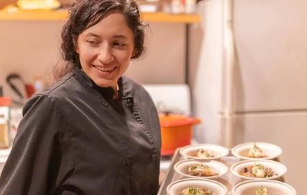 Chef Joanna Barajas Serving Dishes In Private Home