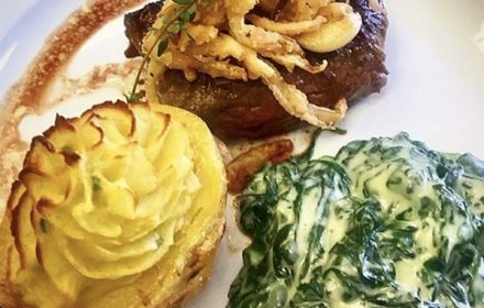 Chef Alex Bahman Rib Eye Cap, Shoestring Onions, Duchess Potatoes, And Creamed Spinach