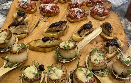 Chef Paul Rousom Canapes Platter on a Wooden Board