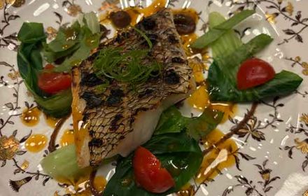 Chef WIlliam Lochetto grilled opakapaka, black bean, bok choy, chorizo oil, culantro