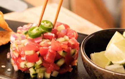 Chef Betty Coquillard spicy mexican shrimp ceviche, lime wedges