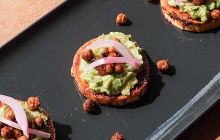Chef Betty Coquillard sweet potatoes canapés topped with fresh guacamole, crispy spicy chickpeas and pickled shallots