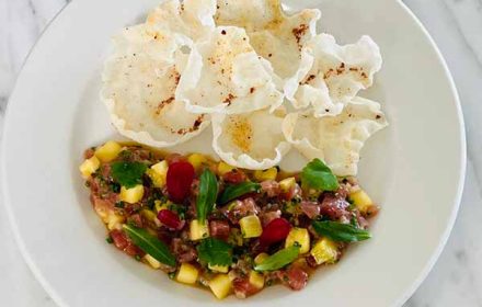 Chef Nick Adams bluefin tuna tartare with charred pineapple, smoked shoyu & rice crackers