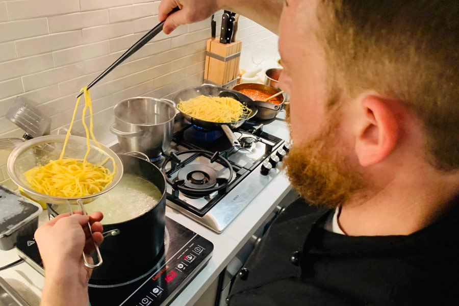 a chef boiling pasta