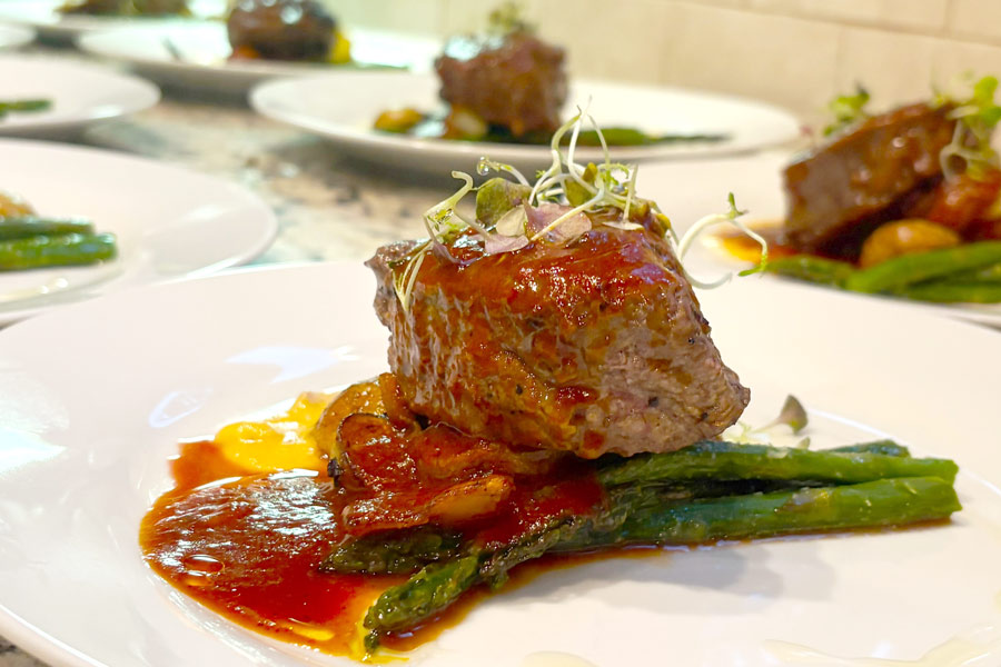 Grilled fillet, mignon burgundy, pearl onion, reduction from chef Kamal Hoyte