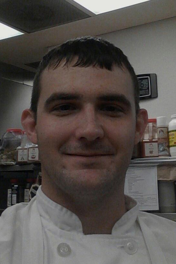 Photo pf Chef Cody Anderson in Chef White Attire