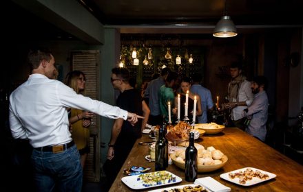 a group of guests are having a work party