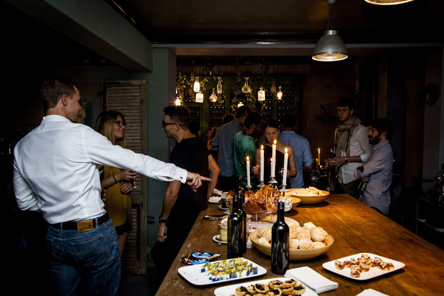 a group of guests are having a work party