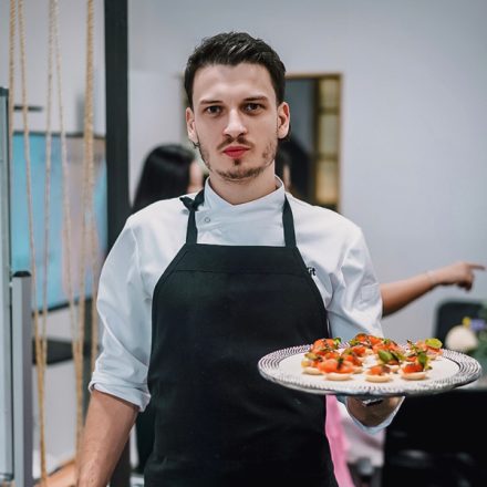 chef vaclav vit presenting canapes ocean trout gravlax blinis creme fraiche pears ginger